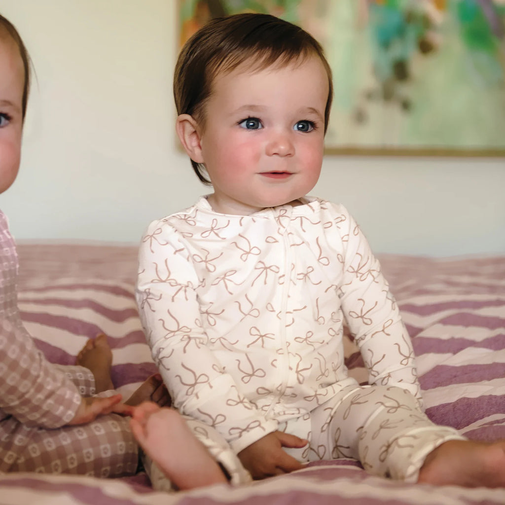 Ivory Bow Onesie